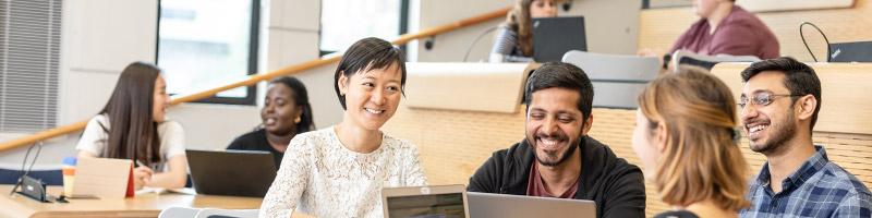 Masters students working together in a seminar