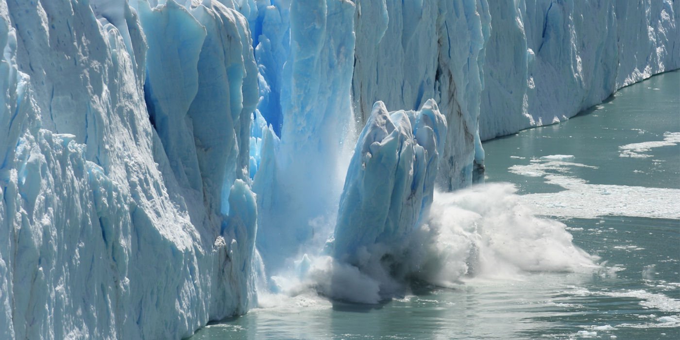 Iceberg with piece falling min