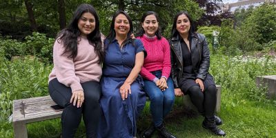 Researchers on a bench in the sustainability gardens on campus. Left to right: Alejandra Zazueta-Lopez, Gabriela Lopez-Gonzalez, Dania Ceballos Vázquez, Osiris Díaz Torres