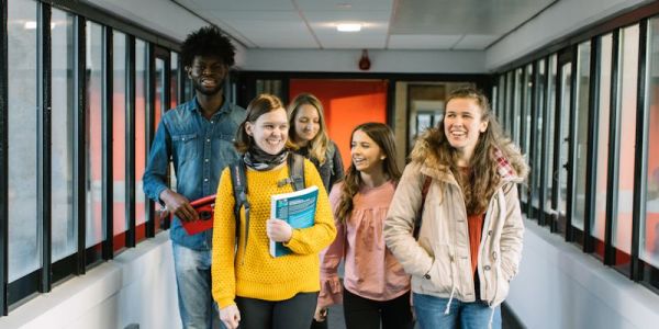 Group of students walking in the School of Geography