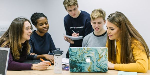 Students in the School of Earth and Environment working together.
