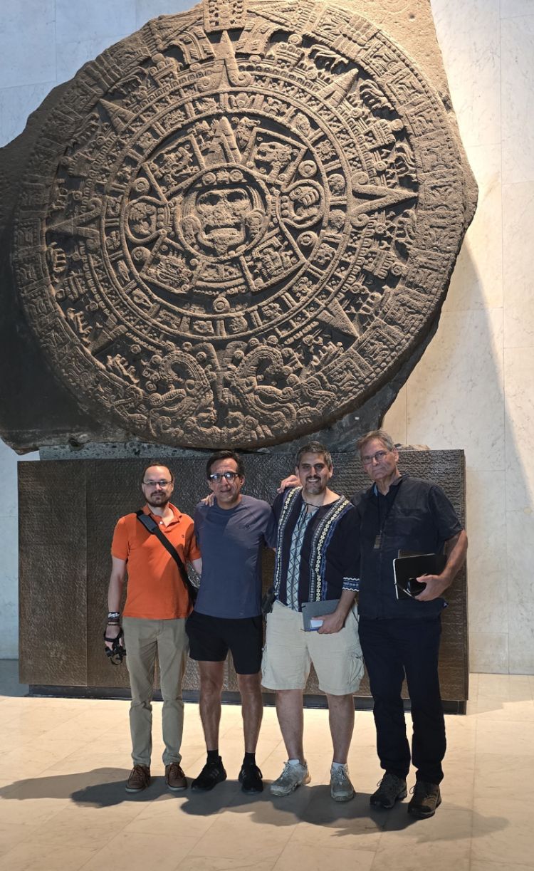 Left to right, Historian Dr Gabriel Kruell, Astronomer Professor Sergio Mendoza, Physicist Dr Oliver López-Corona from UNAM and ecologist Professor Jon Lovett by the Sun Stone in the Museo Nacional de Antropologia.