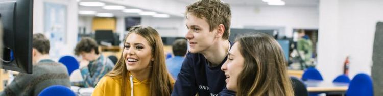 Three students using the facilities in the Earth Visualisation Lab.